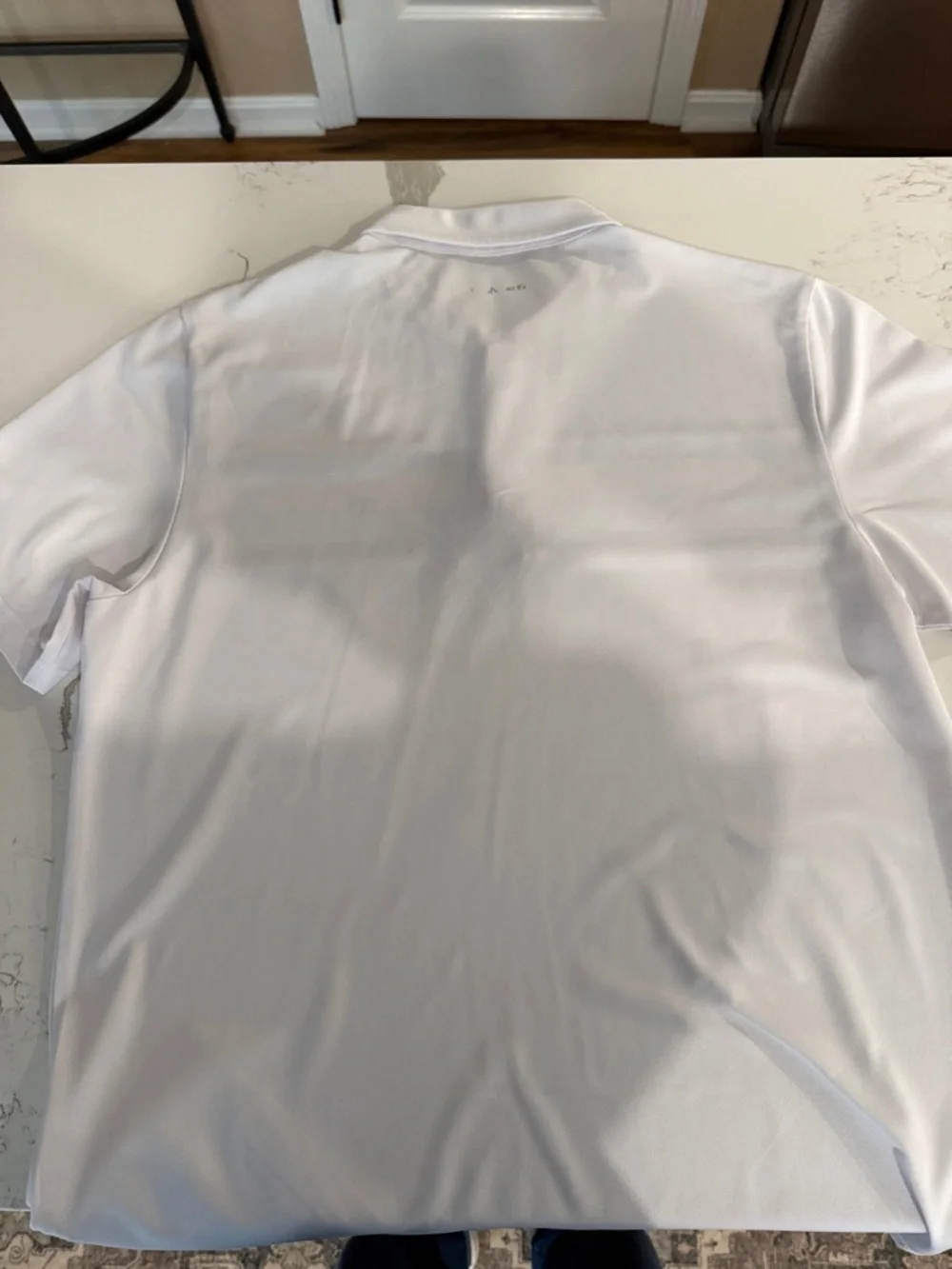 Travis Mathew White Polo with Navy and Yellow Stripes - Picture 5 of 5